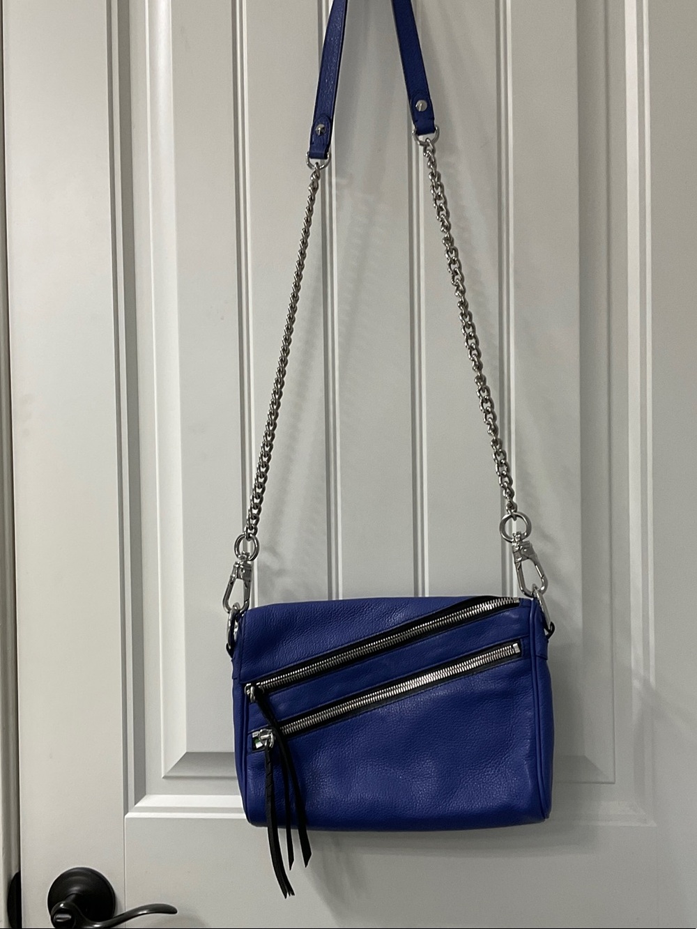 orYany Blue Leather Crossbody Bag with Silver Chain Strap